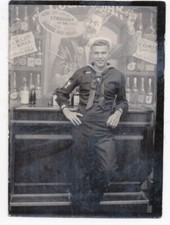 Original WWII Photo of Handsome Sailor in Uniform leaning against Bar