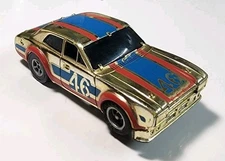 Vintage Aurora AFX Gold Chrome #46 Ford Escort HO Slot Car Magna-Traction