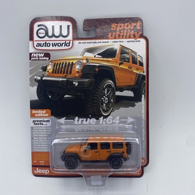 AUTO WORLD 1:64 2023 PREMIUM R2/A3 2013 Jeep Wrangler Unlimited Moab Orange E24