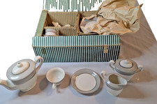 Antique original kids porcelain tea set in original box. Color White and Green