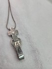 2This is a Brighton cross pendant and chain lanyard, often used as an ID badge — photo 5