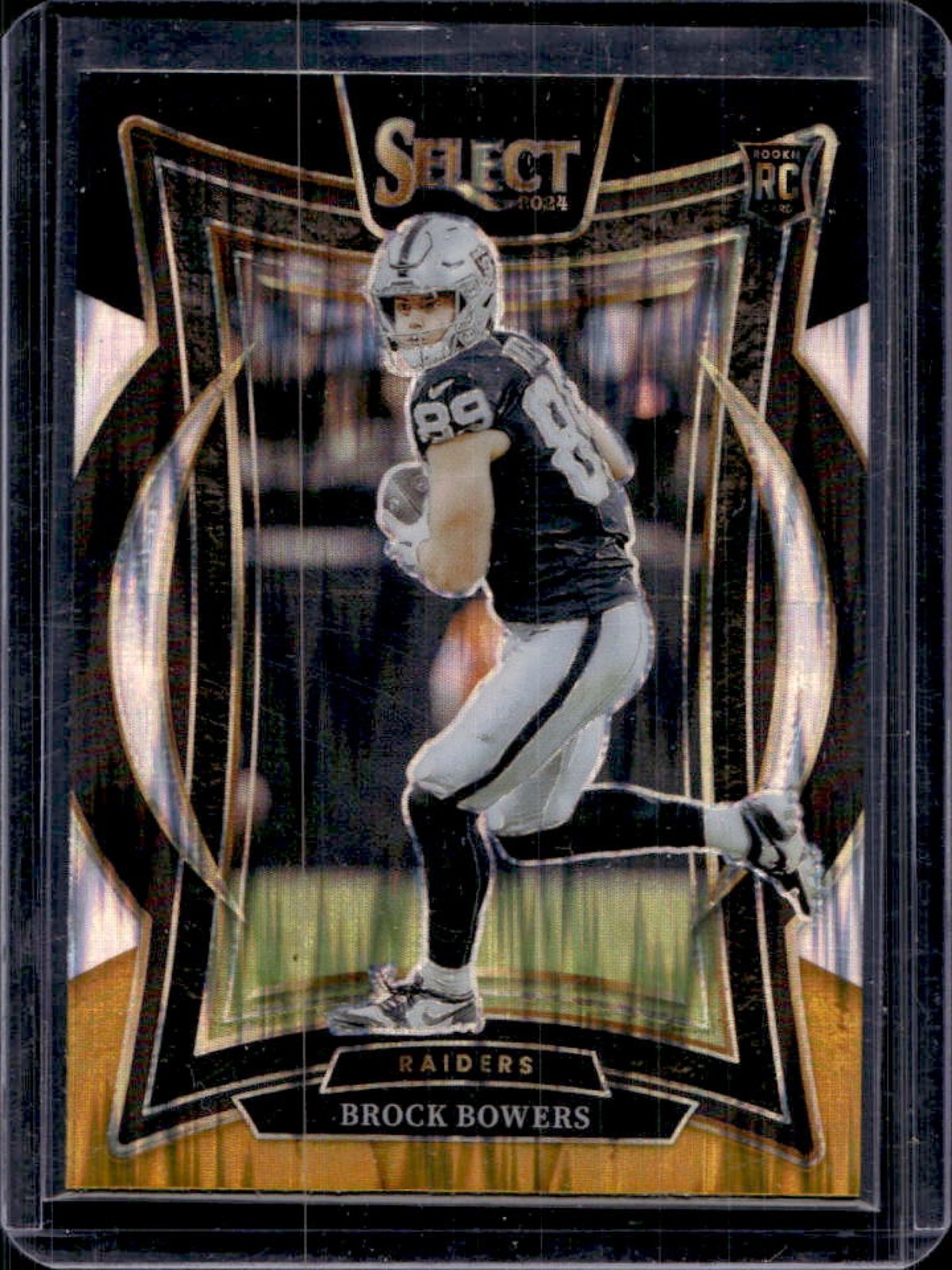 2024 Select Brock Bowers Concourse RC Black and Orange Prizm Shock #31 Raiders