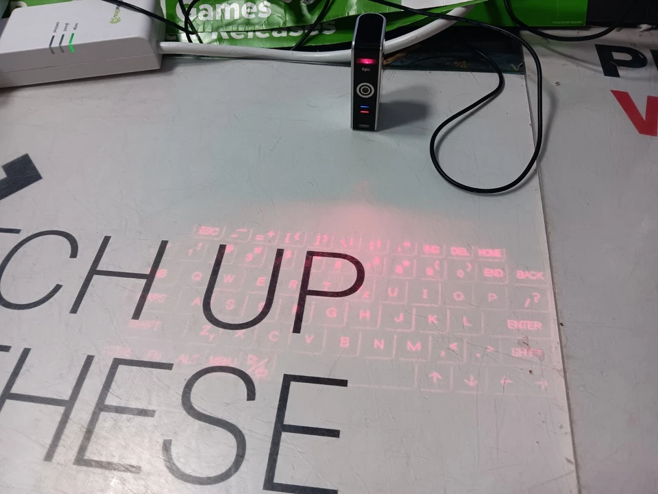 Epic Mobile BT Projection Keyboard-Working-Connects-Super HARD to Use-READ ALL - Image 4 of 4