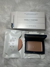 Merle Norman Total Finish....  Shade is MEDIUM DEEP NEUTRAL....NEW