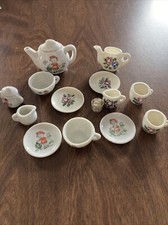 Miniature Childs Tea 14 Piece White Porcelain W/Flowers And Cartoons Characters