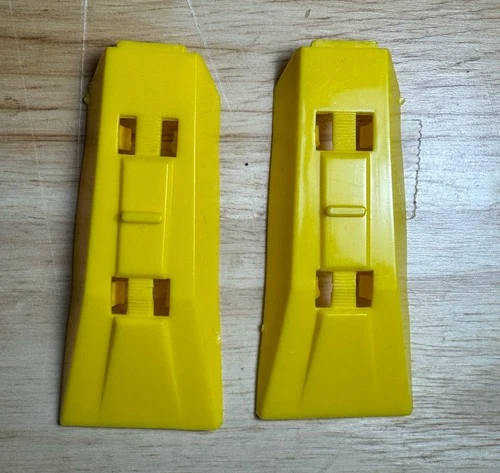 1985 G1 Transformers OMEGA SUPREME parts: YELLOW THIGH ARMOR PIECES