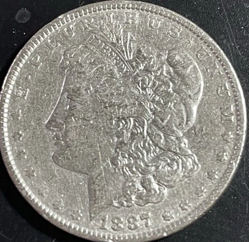 1887 $1 Morgan Silver Dollar. 90% Silver.  #1861￼