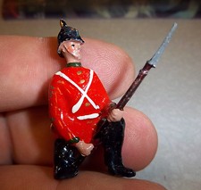 Hand made  painted Lead soldier infantryman approx 1.5 inches tall- red uniform