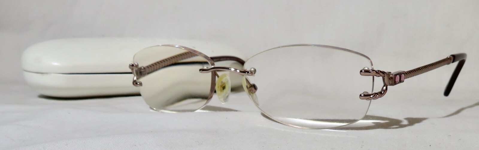 Tura 576 Eyeglass frame 5518135 Rimless w/ rose gold connections