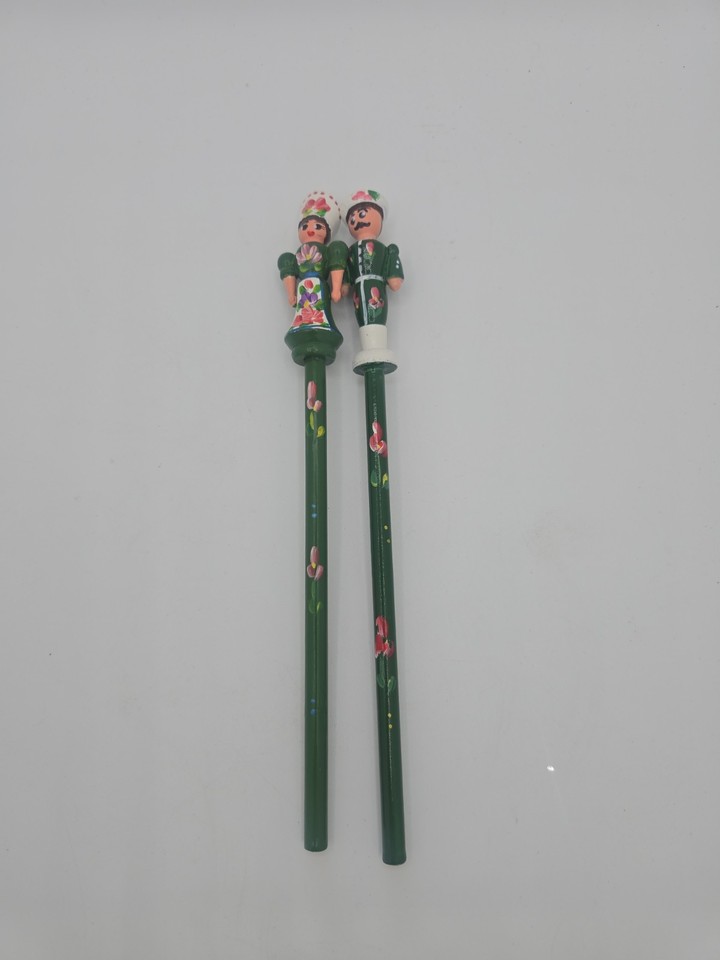 Hand-painted Hungarian folk art pencil toppers are a genuinely unique desk accessory that double as tiny wearable art — impossible to find in any big-box store.