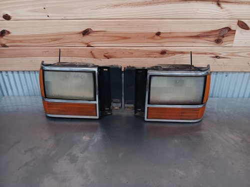 89-92 ford ranger oem headlight and trim set