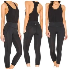 FP Movement Eye on the Prize jumpsuit Size medium black one-piece jumpsuit