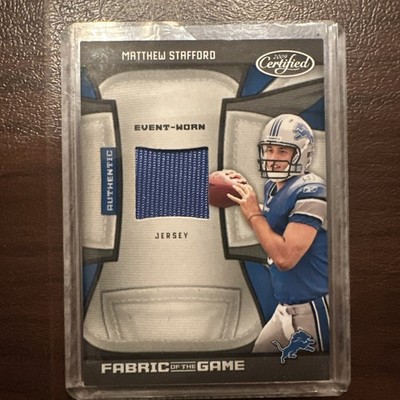 MATTHEW STAFFORD 2009 CERTIFIED FABRIC OF THE GAME /100 WORN AT ROOKIE PREMIERE 
