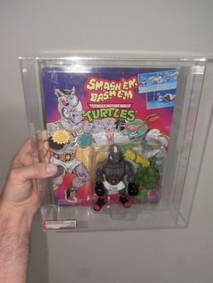 Graded 75 TMNT Smash 'Em Bash 'Em Power Punchin  Rocksteady Playmates 1992