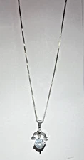Single CZ Solitaire Set in 925 Silver Libra Motif Pendant 18" Silver Box Chain.