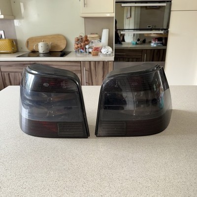 VW GOLF IV 97-03 REAR LAMPS HELLA MAGIC COLORS BLACK LEFT RIGHT COMPLETE damage