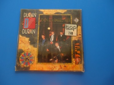 Duran Duran Seven and The Ragged Tiger LP (1983) ST-12310 Water damaged cover