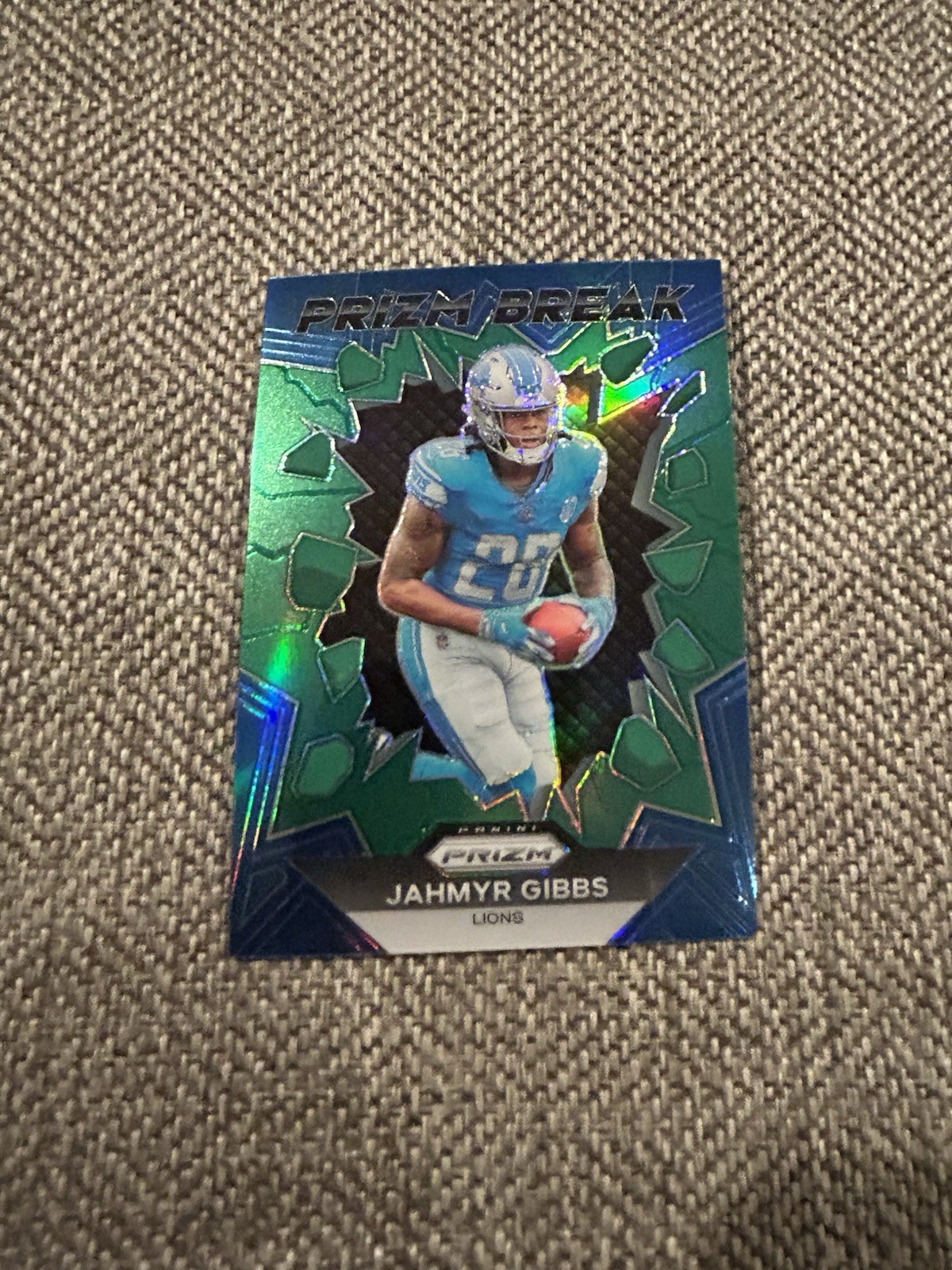 2023 Panini Prizm - Prizm Break Jahmyr Gibbs #PB-5 Green Prizm (RC)