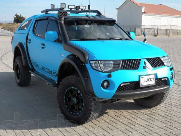 Pare-soleil avant déflecteur de pare-brise Mitsubishi L200 2006-2015 - Photo 1/4