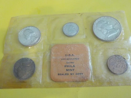 1958   mint    set     .800 silver   plastic   has   aged   and   its  yellowing