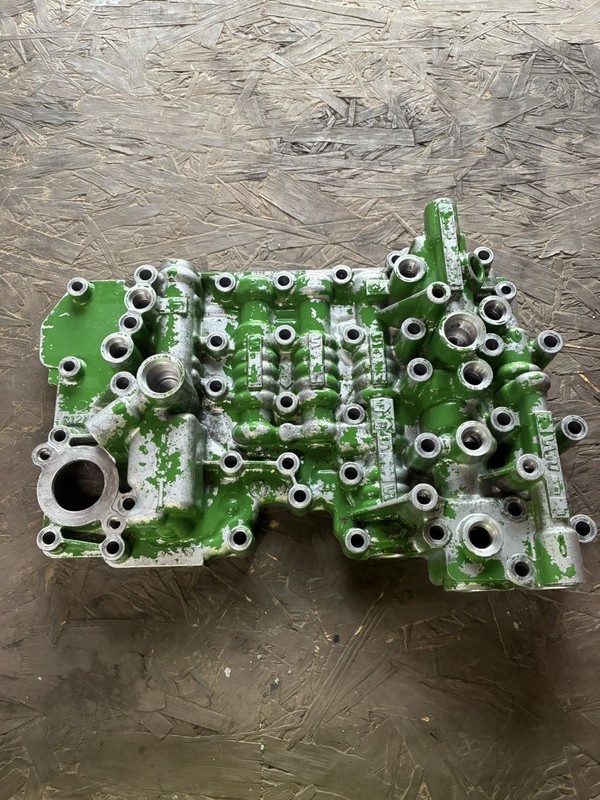 John Deere R124020 Transmission Valve Housing R129280