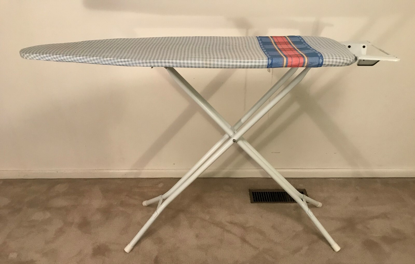 Seymour ironing board with cover and attached iron rest/ FREE LOCAL