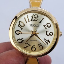 Studio 32MM Women's Open Cuff Watch Gold Dial Gold Band 6" New Battery