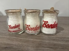 Three Bordens Dairy Creamers