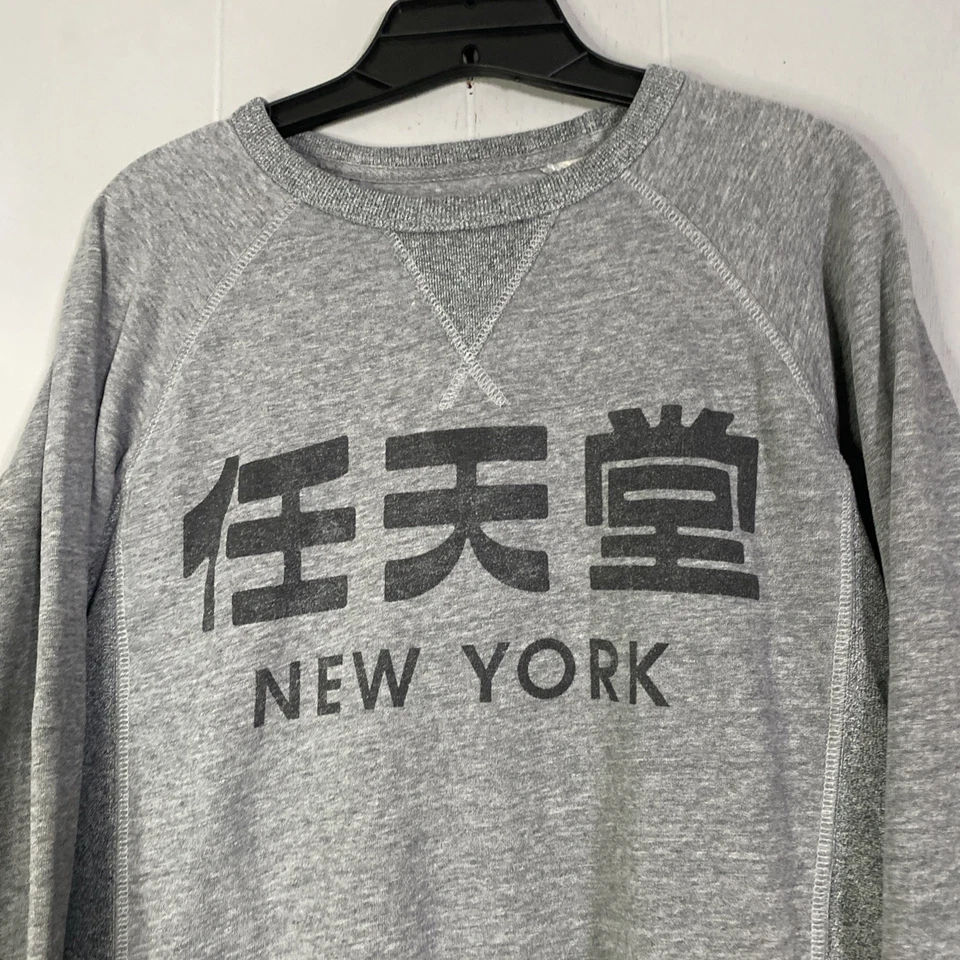 Sudadera Nintendo New York Kanji Logo Cuello Redondo Gris Unisex Pequeña Cuadrada 21x26 Foto 2 de 4