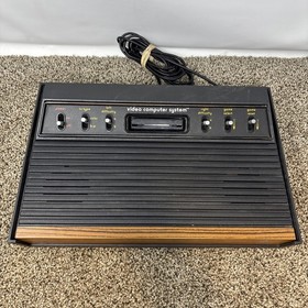 Atari 2600 System Bundle with Console, 30 Games, Joystick, Paddles, and More LOT