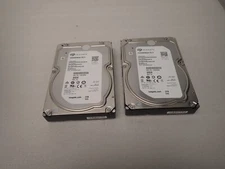 Lot of (2) ST3000NM0023 Seagate 9ZM278 3TB 7.2K RPM 6Gb/s 3.5" SAS Server HDD