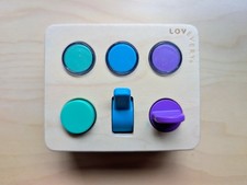 Lovevery Tableau Sensoriel Montessori Bébé Jouet Boutons Boutons Tout-Petit
