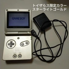 Game Boy Advance SP Starlight Gold with charger