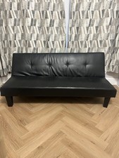 Black faux leather sofa bed/futon