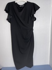 'LBD". Black Dress Size L Ruffle Sleeve Tie In Back Side Zip Classic Look