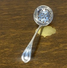 A Lily Pattern Sugar Sifter Ladle, Unmarked,5 1/2 ins .