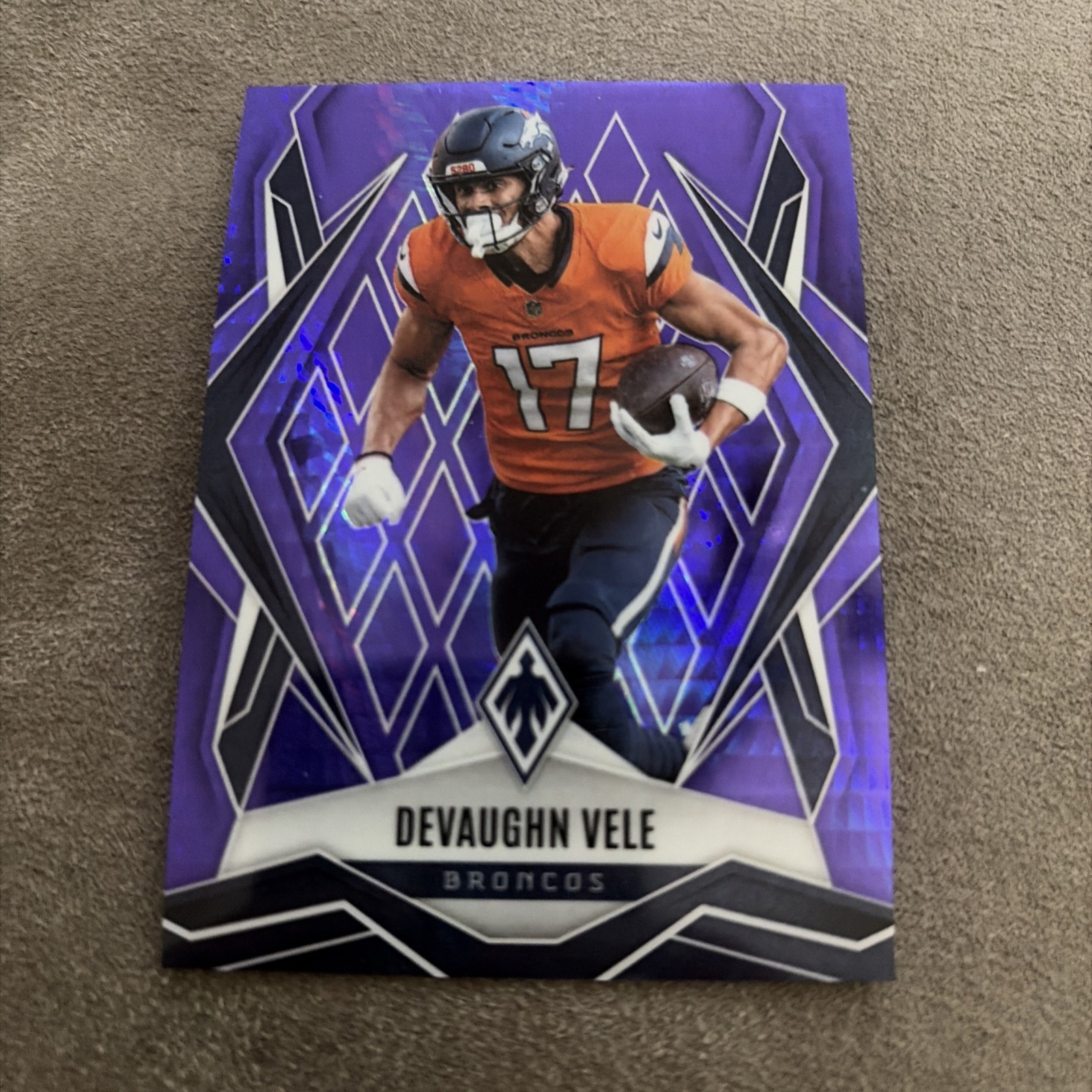 2025 Panini Phoenix #14 Devaughn Vele Purple Winter Prizm #/249