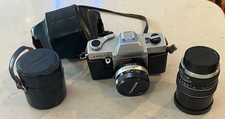 Topcon Uni 35mm SLR Camera w Lens Cap Extra 1:4 lens 100mm 1:2.8 lens 135mm