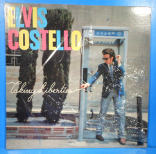 ELVIS COSTELLO TAKING LIBERTIES LP 1980 SHRINK GREAT CONDITION! VG++/VG++!!D