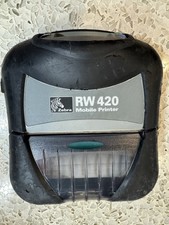 Used Zebra RW420 Wireless Mobile Printer NO charging cable. Battery Included.