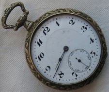 Cyma pocket watch open face nickel chromiun carved casebalance Ok. enamel dial