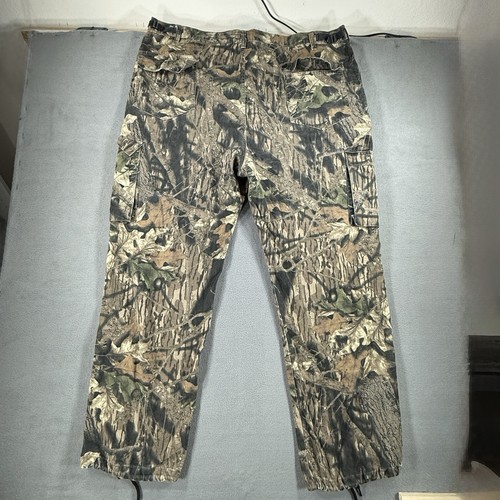 Vintage men’s 2XL cargo pants with brown, green, and beige camo pattern, USA made, and drawstring waist.