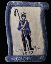 Plaque soldat brodée WWI 1917 WHW dans cadre en métal moulé