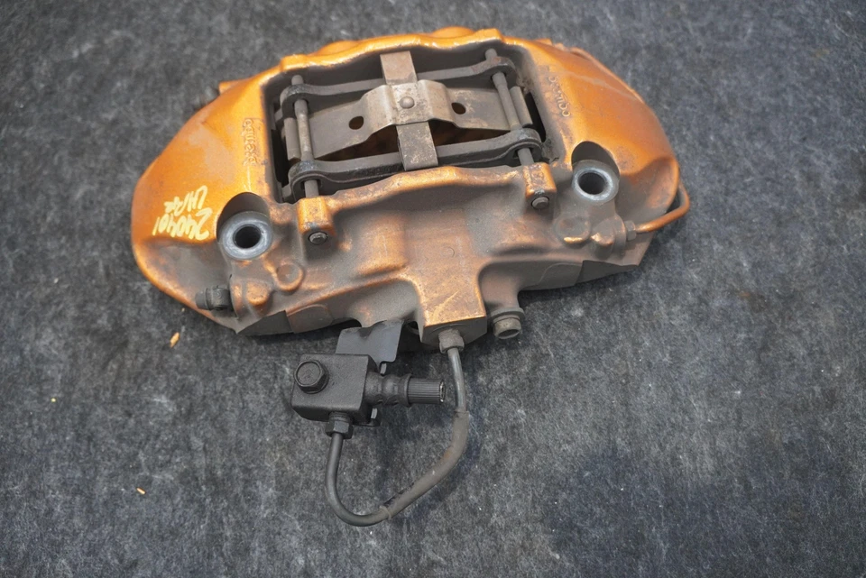 Pinza de freno trasera izquierda 44011JF20D OEM Nissan GT-R 2010-21 Foto 2 de 4