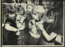 1976 Press Photo Kienast quints compare watches received for their 6th birthday
