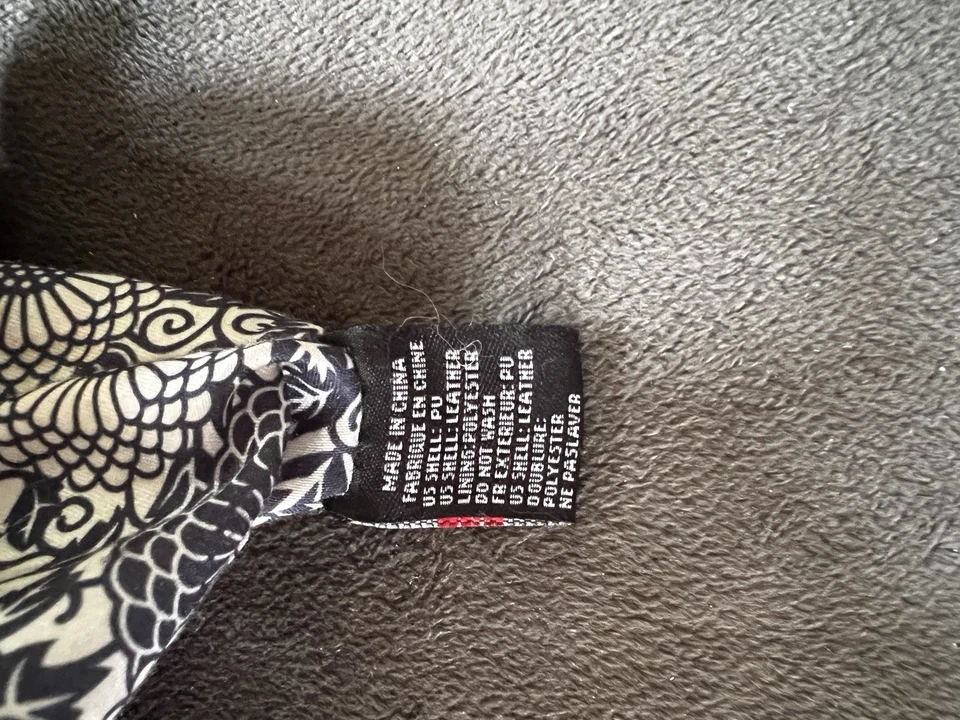 Bolso de hombro Moda Luxe de cuero tostado, con elegantes detalles de flecos Foto 4 de 4