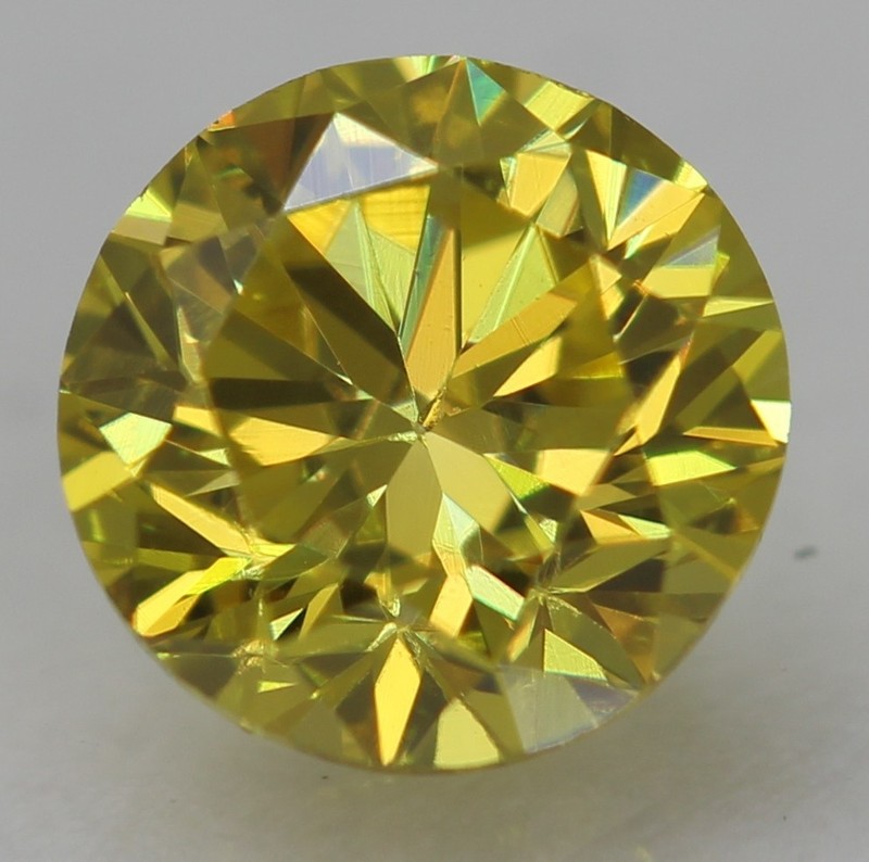 0.30 Ct Canary Yellow VVS2 Round Brilliant Natural Enhanced Diamond 4.15mm VIDEO