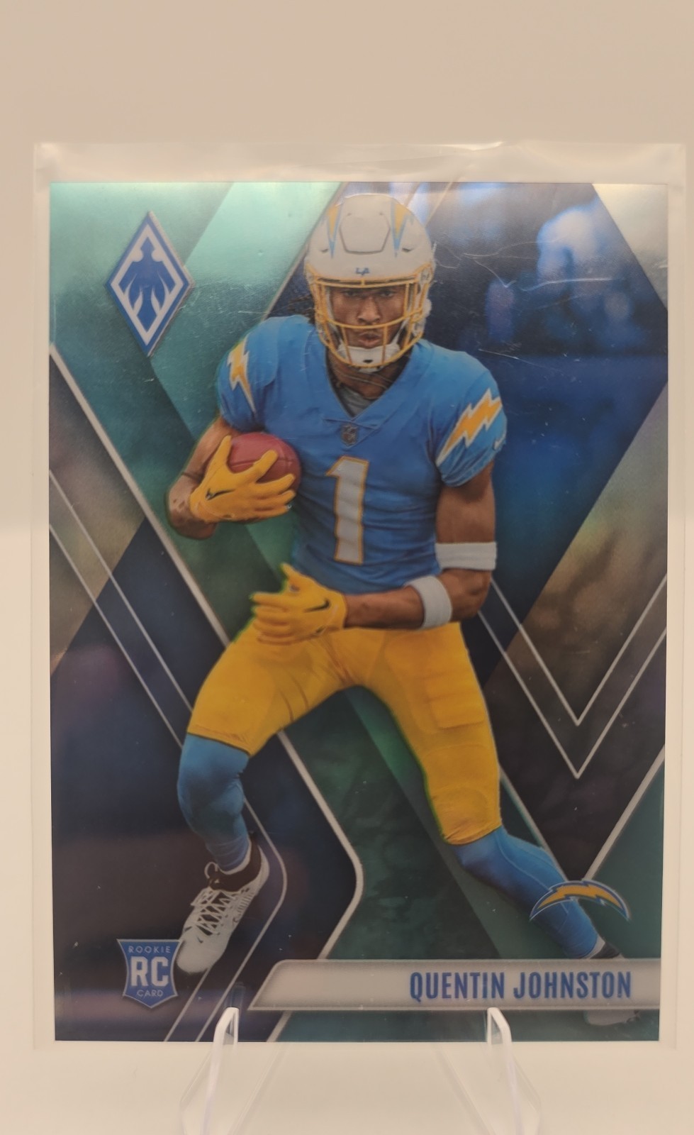 2023 Panini Phoenix - Rookies Quentin Johnston #107 Teal 136/150 (RC)