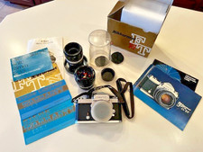 Nikkormat FTN fotocamera 35 mm con Nikon Micro Nikkor-P 55 mm f/3.5 & Nikkor 85 mm f/1.8