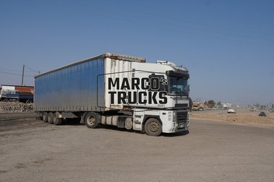 LKW Foto DAF XF 95 Planensattelzug Kirgisistan weiß VENOL #w4wu